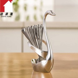 Spoon set with swan stand
